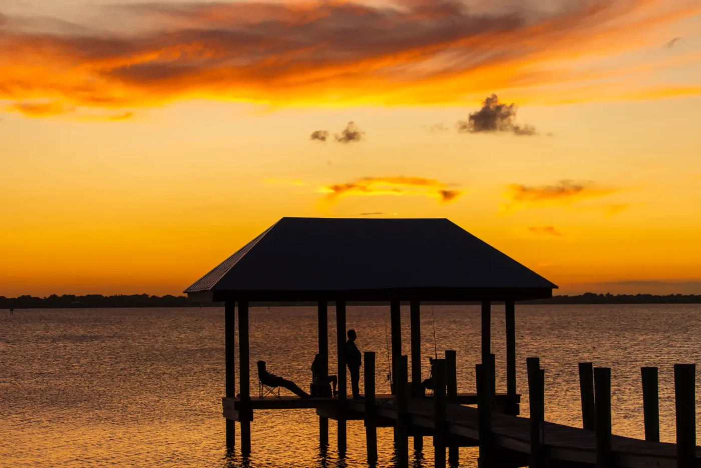 Lake dock pavilion at sunset in Central Florida