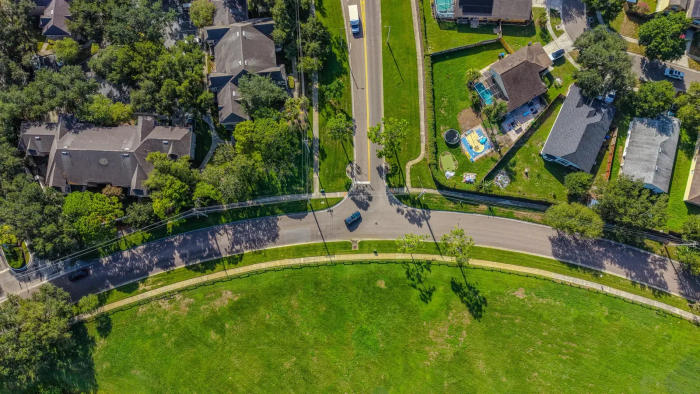 Aerial view of homes around a neighborhood park